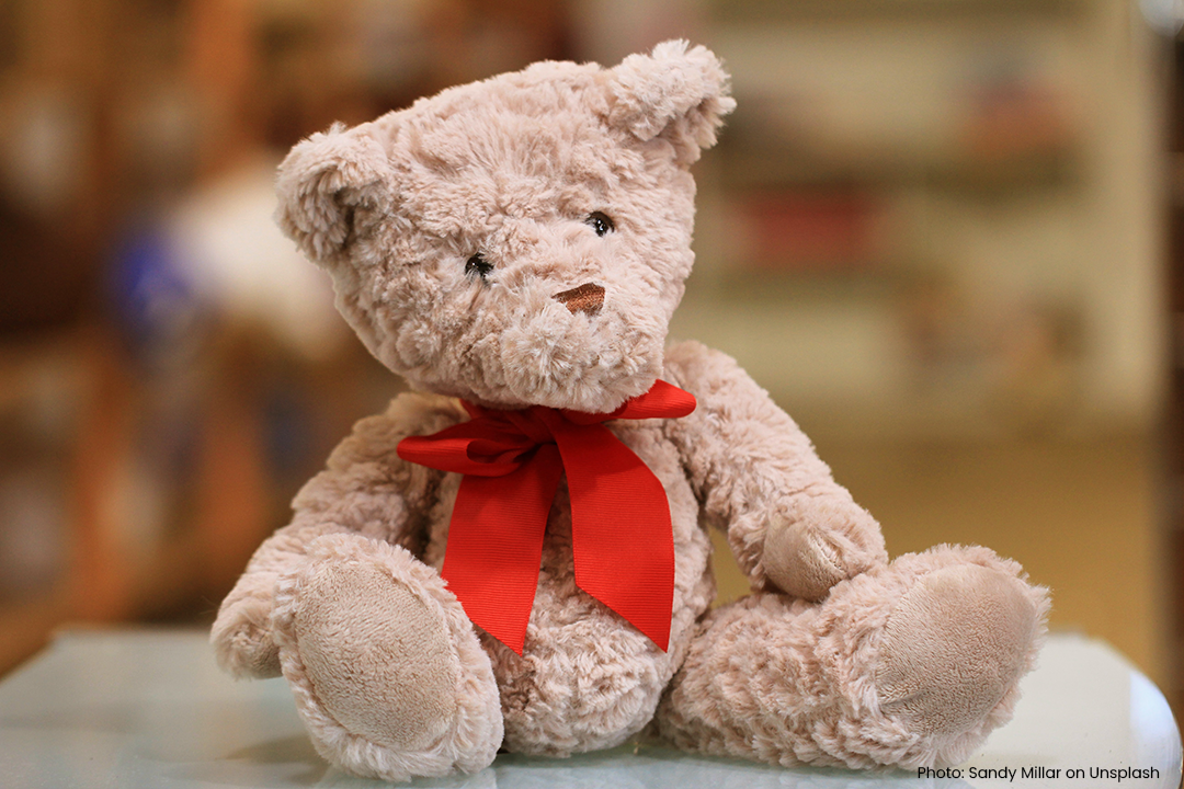 teddy bear with red bow