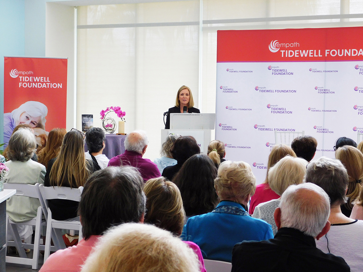 Beth Knopik speaks to attendees at the Tidewell Foundation